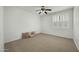 Spacious bedroom with a ceiling fan, plantation shutters, and neutral decor at 2226 W Periwinkle Way, Chandler, AZ 85248