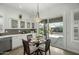 Bright breakfast nook features access to the backyard and complements the adjacent kitchen at 2226 W Periwinkle Way, Chandler, AZ 85248