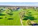 Expansive aerial view of the golf course, lake and community at 2226 W Periwinkle Way, Chandler, AZ 85248