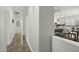 Hallway featuring tile floors and access to living room and other rooms at 2226 W Periwinkle Way, Chandler, AZ 85248