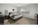 Bright main bedroom with plantation shutters and neutral decor at 2226 W Periwinkle Way, Chandler, AZ 85248