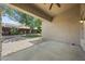 Covered patio area with ceiling fan and view of the landscaped backyard at 2226 W Periwinkle Way, Chandler, AZ 85248