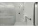 Walk-in shower featuring a bench and grab bar at 2226 W Periwinkle Way, Chandler, AZ 85248