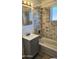 Beautiful bathroom with stylish tile shower and updated vanity at 227 N Morris --, Mesa, AZ 85201