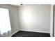 This bedroom has vinyl floors, a ceiling fan, and a window at 227 N Morris --, Mesa, AZ 85201