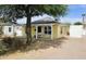 Exterior of a charming yellow home with a well-manicured front yard at 227 N Morris --, Mesa, AZ 85201