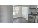 Efficient kitchen features stainless steel appliances and a sunlit dining nook at 227 N Morris --, Mesa, AZ 85201
