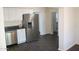 Spacious kitchen area showcasing stainless steel appliances and seamless access to other rooms at 227 N Morris --, Mesa, AZ 85201
