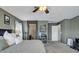 Bedroom boasts calm, neutral colors and includes an ensuite at 2302 E Paraiso Dr, Phoenix, AZ 85024
