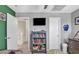 Bedroom showing a bookshelf and a television at 2302 E Paraiso Dr, Phoenix, AZ 85024