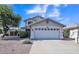 Charming two-story home with a well-manicured front yard and a two-car garage at 2302 E Paraiso Dr, Phoenix, AZ 85024