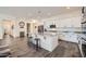 Spacious kitchen with a center island, perfect for cooking and entertaining, and white cabinets at 23139 E Via Del Sol --, Queen Creek, AZ 85142