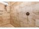 Shower stall featuring beautiful brown tiling, shower head, and fixture at 291 E Canyon Rock Rd, San Tan Valley, AZ 85143