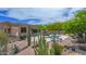 Charming backyard oasis with pool, desert landscaping, and mountain views at 29619 N 142Nd Pl, Scottsdale, AZ 85262