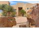 Front entryway featuring a custom wood door at 29619 N 142Nd Pl, Scottsdale, AZ 85262