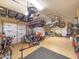 Spacious garage with organization systems, overhead storage, bikes, and motorcycles at 29619 N 142Nd Pl, Scottsdale, AZ 85262