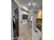 This hallway features a stone tile floor, and two separate niches at 29619 N 142Nd Pl, Scottsdale, AZ 85262