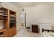 Bedroom featuring wood-look floors and an attached bathroom at 3038 W Trapanotto Rd, Phoenix, AZ 85086