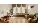 Cozy living room featuring neutral tones and comfortable seating arrangements at 3038 W Trapanotto Rd, Phoenix, AZ 85086