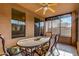 Relaxing covered patio with dining table and outdoor seating area at 3038 W Trapanotto Rd, Phoenix, AZ 85086