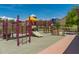 Community playground with slides, climbing structures, and soft surfaces, providing a fun and safe environment for children at 3038 W Trapanotto Rd, Phoenix, AZ 85086