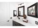 Bathroom features elegant dark cabinets and white stone countertops at 30600 N Pima Rd # 81, Scottsdale, AZ 85266