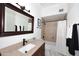 This bathroom includes a vanity and shower-tub combination at 30600 N Pima Rd # 81, Scottsdale, AZ 85266