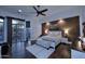 This bedroom includes carpeted floors and views of the home's backyard at 30600 N Pima Rd # 81, Scottsdale, AZ 85266