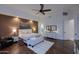 This bedroom includes carpeted floors, ceiling fan and seating area at 30600 N Pima Rd # 81, Scottsdale, AZ 85266