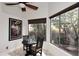 Breakfast nook features a bistro table and large windows with desert views at 30600 N Pima Rd # 81, Scottsdale, AZ 85266