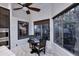 Cozy breakfast nook with marble floors, corner windows, ceiling fan, and views of lush greenery at 30600 N Pima Rd # 81, Scottsdale, AZ 85266