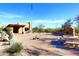 Community area featuring a ramada, basketball court, barbeque pit, and desert landscaping at 30600 N Pima Rd # 81, Scottsdale, AZ 85266
