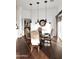 Elegant dining room with a decorative table, stylish chairs, and sliding doors to the outdoor space at 30600 N Pima Rd # 81, Scottsdale, AZ 85266