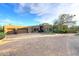 This home features a large paver driveway and mature desert landscaping at 30600 N Pima Rd # 81, Scottsdale, AZ 85266
