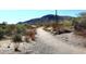 Scenic hiking trail featuring desert landscaping and mountain views under a clear blue sky at 30600 N Pima Rd # 81, Scottsdale, AZ 85266