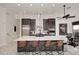 Spacious kitchen with an island, modern stainless steel appliances, and breakfast nook at 30600 N Pima Rd # 81, Scottsdale, AZ 85266
