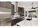 Modern kitchen features a stainless steel fridge and gas stove, creating a chef's dream at 30600 N Pima Rd # 81, Scottsdale, AZ 85266