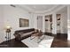 Elegant living room with stylish furniture, wood floors, and a neutral color scheme at 30600 N Pima Rd # 81, Scottsdale, AZ 85266