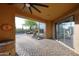 Covered outdoor patio with view of pool and desert landscaping. Ideal for entertaining and relaxing at 30600 N Pima Rd # 81, Scottsdale, AZ 85266