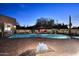 Outdoor oasis with a sparkling pool, comfortable lounge chairs, and desert landscaping for ultimate relaxation at 30600 N Pima Rd # 81, Scottsdale, AZ 85266