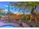Backyard pool featuring desert landscaping at 30600 N Pima Rd # 81, Scottsdale, AZ 85266