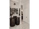 The wine room features an area for wine tasting and unique design elements at 30600 N Pima Rd # 81, Scottsdale, AZ 85266