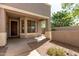 Welcoming covered entry highlighting a modern design with neutral stucco walls and manicured desert landscaping at 3241 E Hampton Ln, Gilbert, AZ 85295