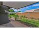 Inviting covered patio and fenced yard, perfect for entertaining and relaxation at 3284 E Sandy Way, Gilbert, AZ 85297