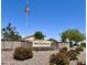 Attractive stone 'San Tan Ranch' community sign with flowering shrubs at 3284 E Sandy Way, Gilbert, AZ 85297
