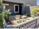 A cozy shaded patio with desert landscaping and comfortable seating offers outdoor enjoyment at 3284 E Sandy Way, Gilbert, AZ 85297