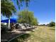 Community playground with modern equipment and mature trees at 3284 E Sandy Way, Gilbert, AZ 85297