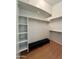 Spacious walk-in closet with built-in shelving, ample storage space, and a bench at 3284 E Sandy Way, Gilbert, AZ 85297