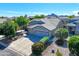 Inviting single-Gathering home with a well-maintained yard and a convenient three-car garage at 34942 N Camp Fire Cir, San Tan Valley, AZ 85144