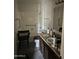 Standard bathroom features a shower/tub combo, single sink vanity, and accessible grab bars at 3556 E Helena Dr, Phoenix, AZ 85032